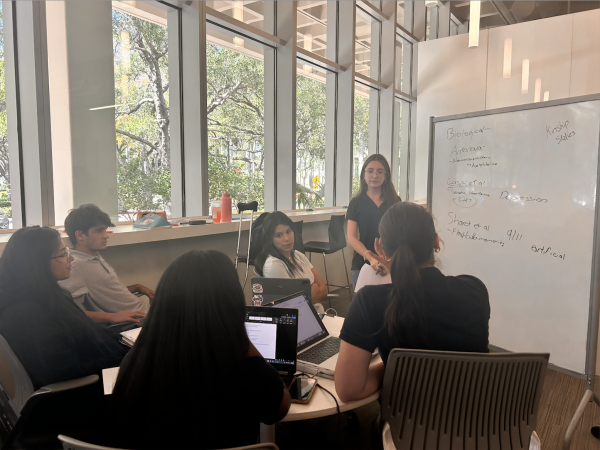 In preparation for the IB Psychology Exam on May 7 and 8, students go over key terms at a study session in the Otto G. Richter Library at the university of Miami, hosted by the IB Executive Council. 